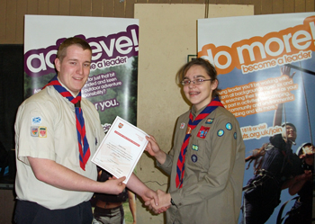 An Explorer Scout from the 3rd EK getting her certificate